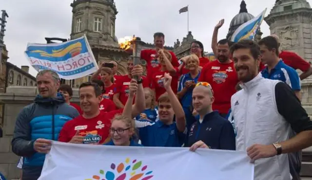 The group of torch bearers on the Queen Victoria memorial in Hull.