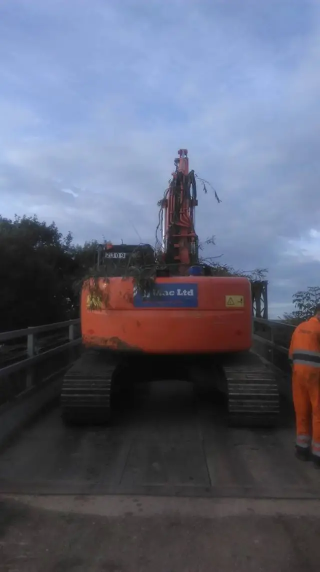 Digger leaving the site of the nature reserve