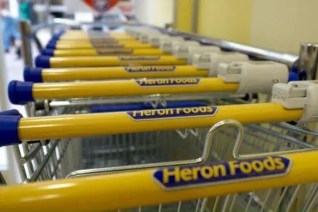 Heron Foods trolleys stacked together.