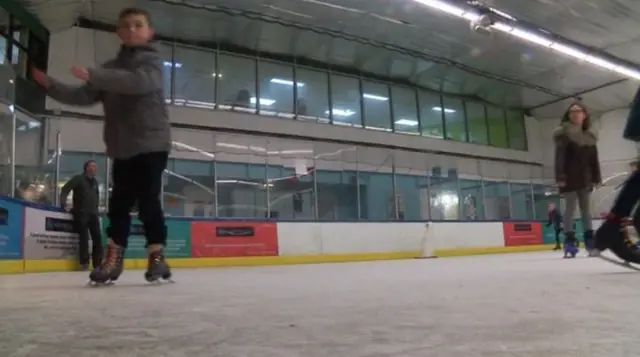 People skating at Grimsby ice arena.