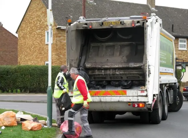 Bin collection on a street.