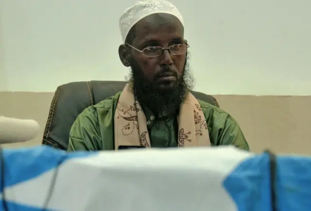 Former Deputy Leader and spokesman of Somalia"s Al-Qaeda-affiliated Shabab rebels, Sheikh Mukhtar Robow, also known as Abu Mansur, speaks to journalists on August 15, 2017 in Mogadishu. A