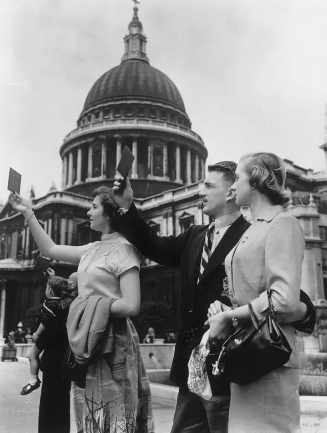 Onlookers view the eclipse