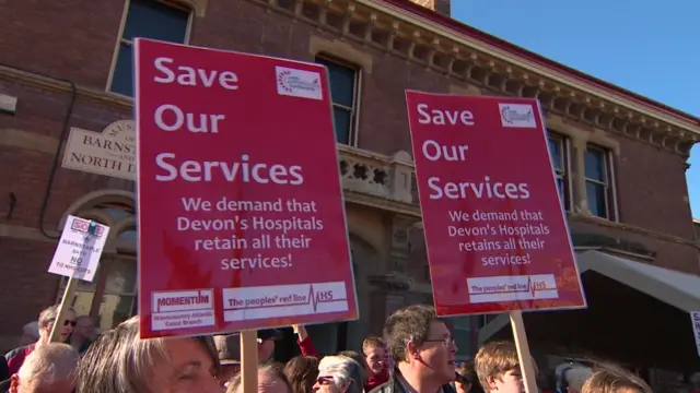 'Save our services' protest signs