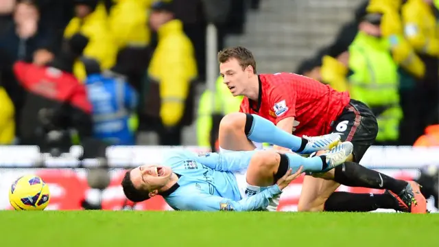 Jonny Evans and Samir Nasri