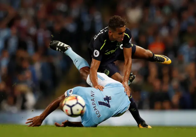 Manchester City's Kompany gets a yellow card