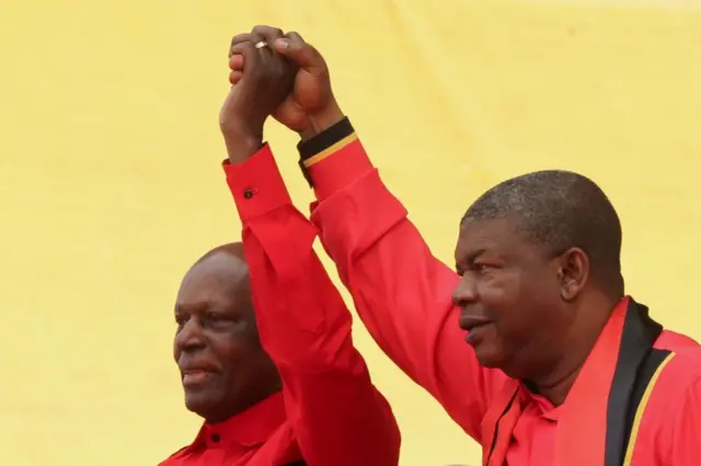 President of Angola Jose Eduardo dos Santos (L) and Joao Lourenco (R), the candidate of the Popular Movement for the Liberation of Angola (MPLA), join hands during an election campaign rally in Luanda, Angola, 19 August 2017