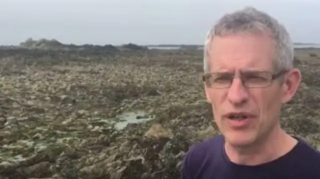 Dr Phil de Jersey speaking at Le Catrioc, on Guernsey's west coast