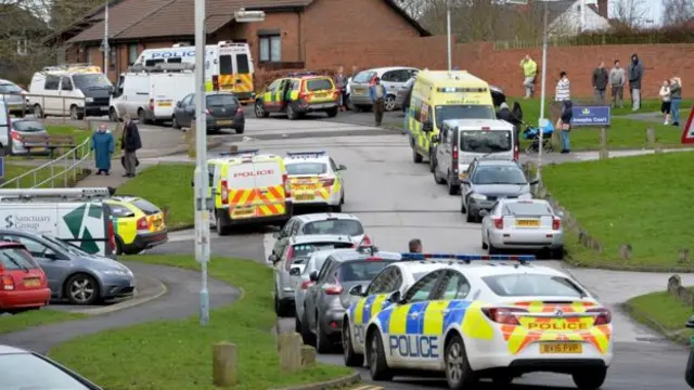 Armed police units used stun grenades to storm the flat in Leasowes Drive, Wolverhampton