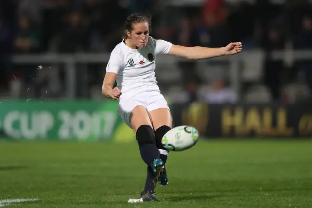 Emily Scarratt of England kicks