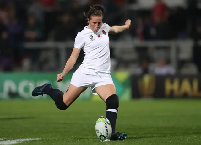 Emily Scarratt of England kicks