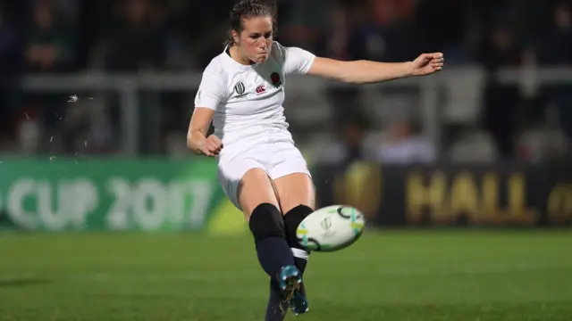 Emily Scarratt kicking a penalty in the game