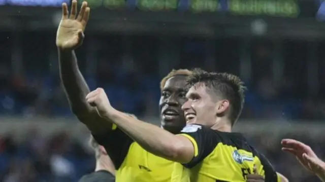 Ben Fox (R) celebrates scoring in Cardiff