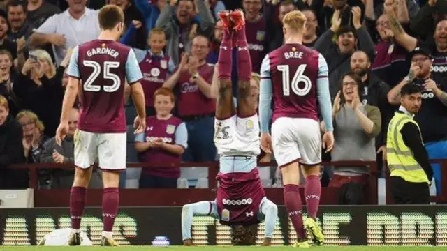 Albert Adomah (centre) celebrated his goal with a headstand