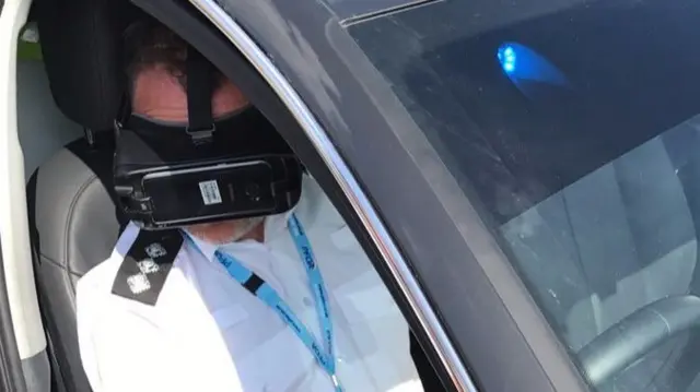 Police officer trying out the VR technology