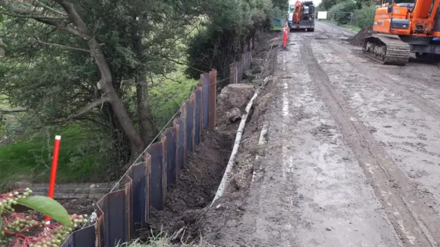 Work to repair the edge of the road