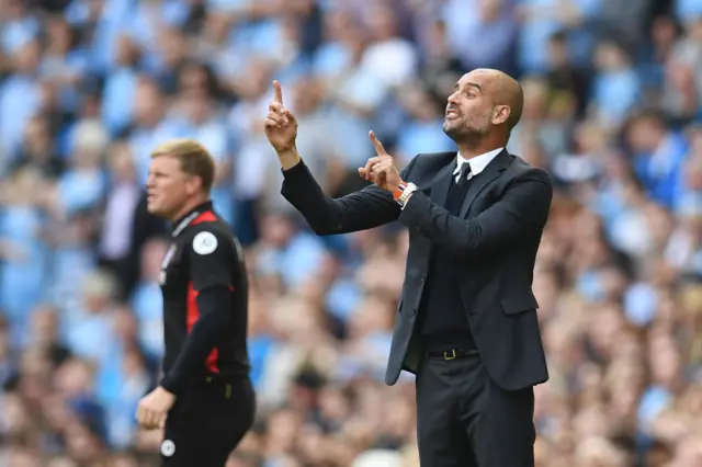 Pep Guardiola and Eddie Howe on the touchline