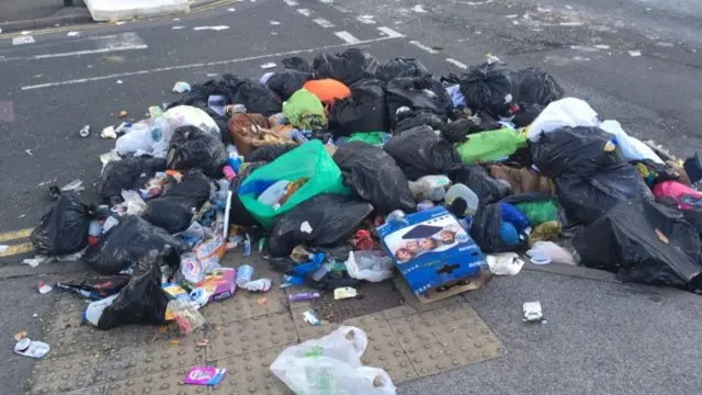 Rubbish bags left in the road