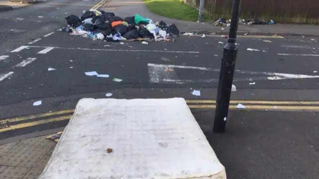 Mattress in the middle of the road