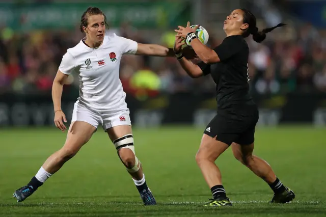 Katy Mclean battles with New Zealand's Stacey Waaka