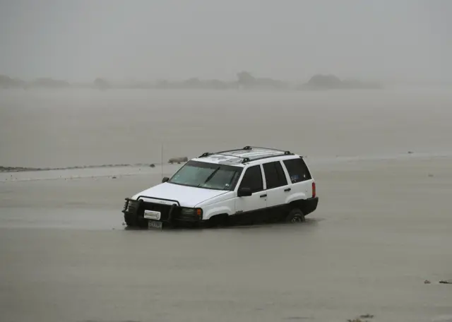 A car lies submerged after Hurricane Harvey hit Corpus Christi, Texas on August 26, 2017