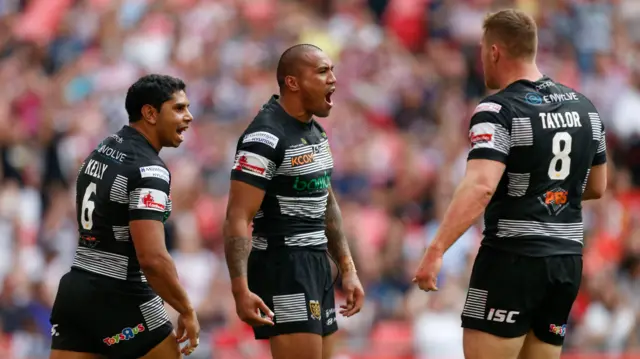 Hull FC"s Fetuli Talanoa celebrates scoring their first try