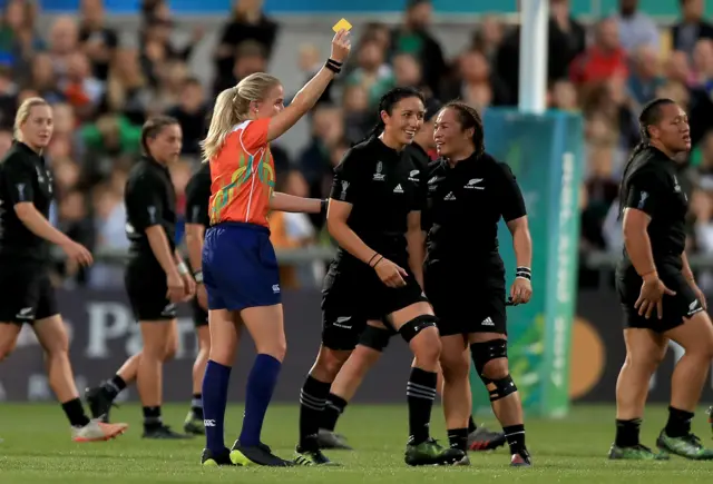 Sarah Goss is shown a yellow card