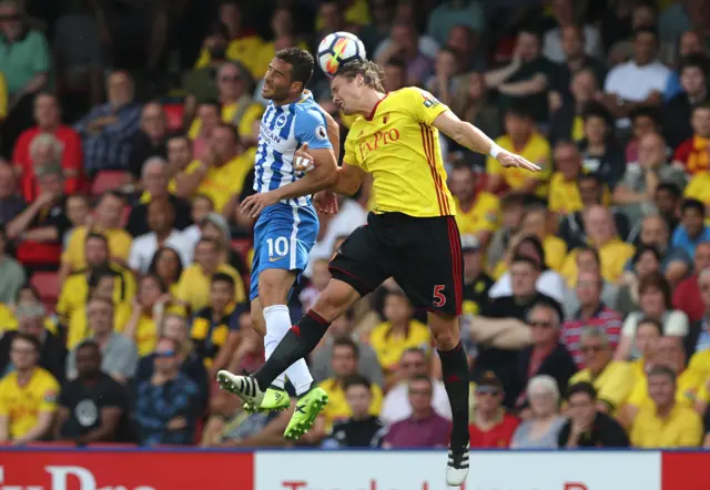 Sebastian Prodl and Tomas Hemed challenge for possession