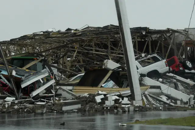 A destroyed building and vehicles at Rockport Airport after heavy damage when Hurricane Harvey hit Rockport, Texas on August 26, 2017.