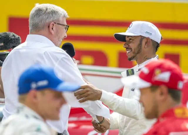 Ross Brawn and Lewis Hamilton