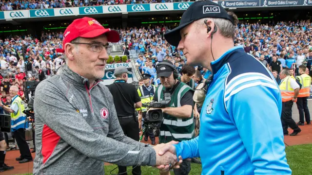 Mickey Harte congratulates Dublin manager Jim Gavin after Sunday's contest