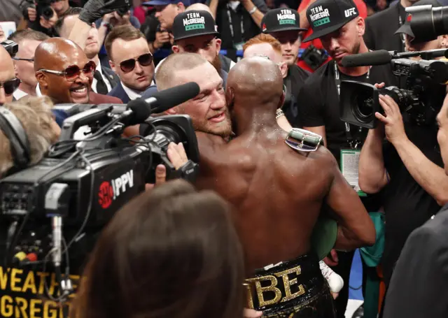 Conor McGregor and Floyd Mayweather Jr congratulate each other