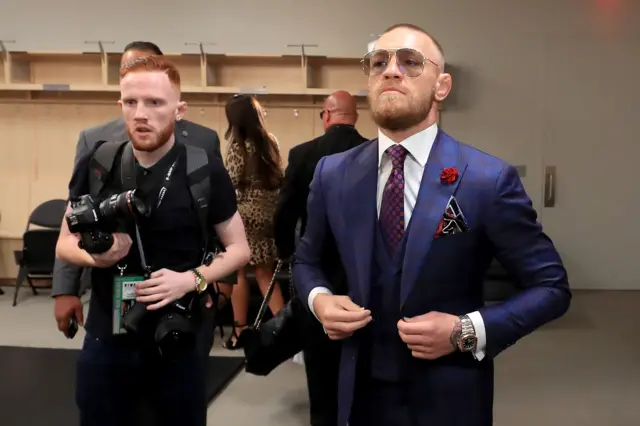 Conor McGregor suits up