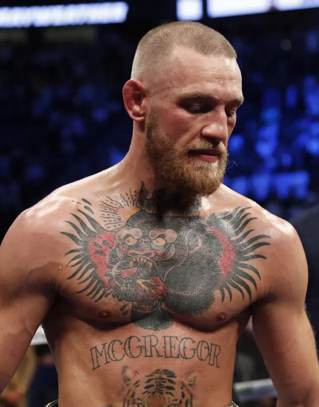 McGregor looks on