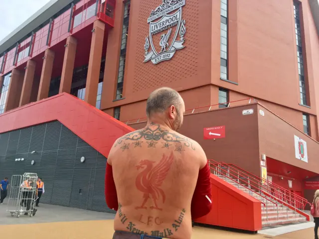 Liverpool fan with back tattoo