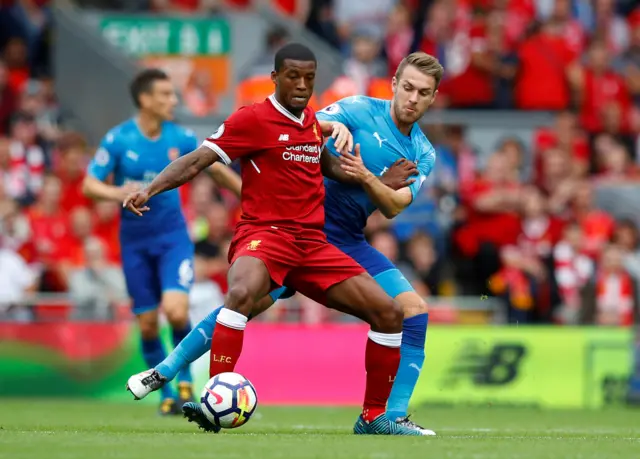 Liverpool's Georginio Wijnaldum in action with Arsenal's Aaron Ramsey