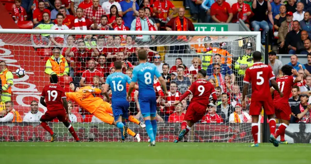 Roberto Firmino heads Liverpool ahead against Arsenal