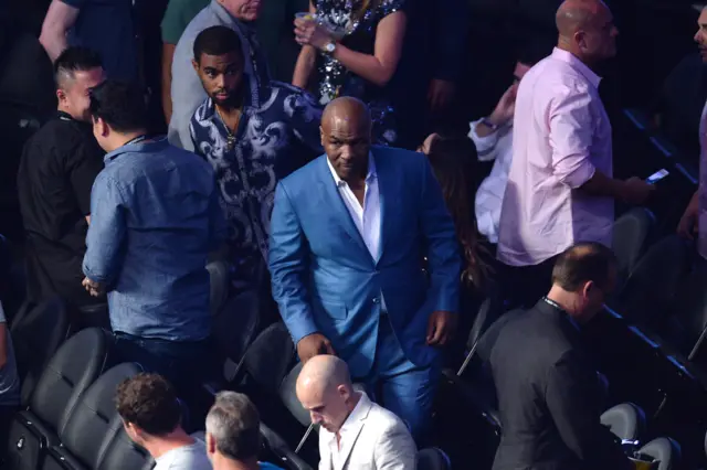 Mike Tyson takes his seat for the main event