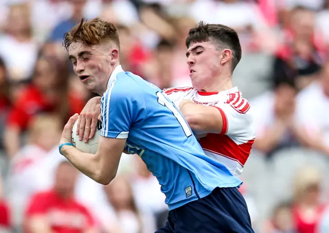 Derry's Oran McGill tackles Dublin's David Lace at Croke Park