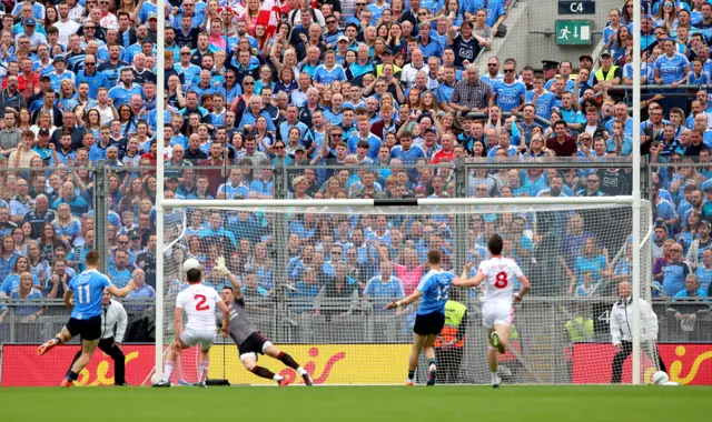 Con O'Callaghan lashes past Niall Morgan at Croke Park