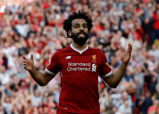 Liverpool's Mohamed Salah celebrates scoring their third goal