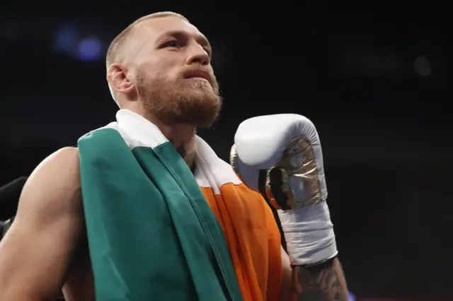 Conor McGregor enters the ring