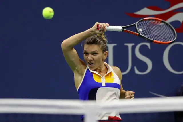 Simona Halep of Romania hits a forehand