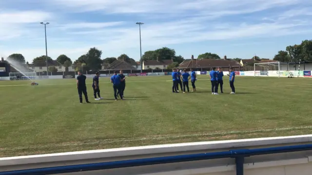 Players warming up ahead of Lowestoft v Leiston