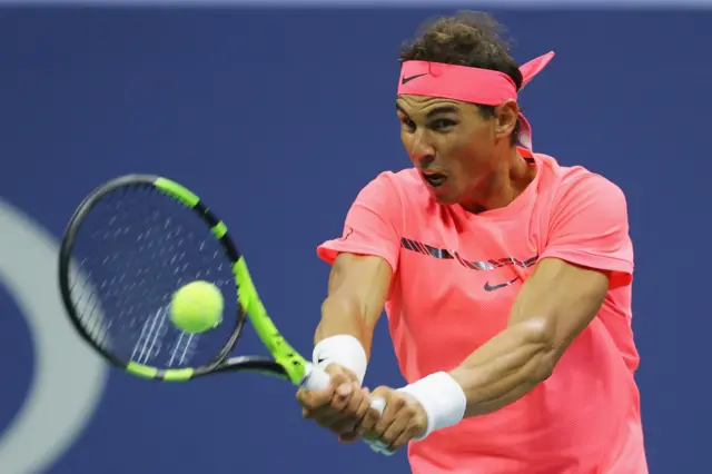 Rafael Nadal of Spain returns