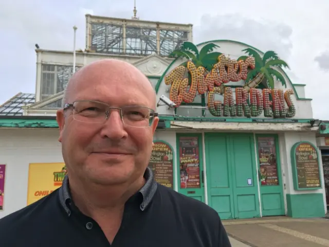 Graham Plant standing in front of Winter Gardens