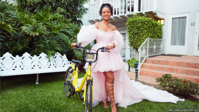 Rihanna with a bike