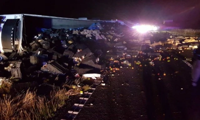 Overturned fruit and veg lorry