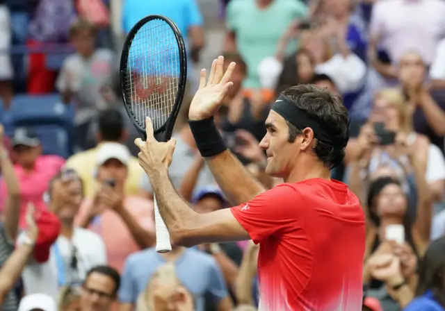 Roger Federer of Switzerland applauds