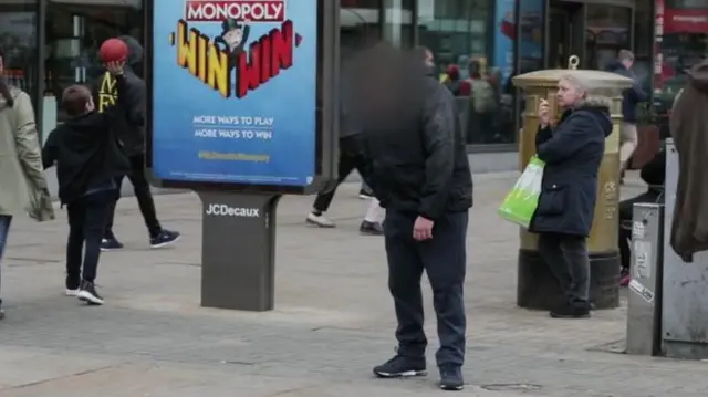 Unidentifiable man appearing to show effects of psychoactive substance